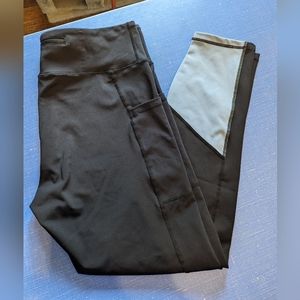 Tomboyx black leggings with light blue accent. 7/8 legging